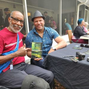 Me & Paul Olden (Rays and Yankees announcer) with book